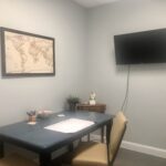 Private office area with desk and chair